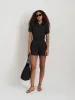 Cassi Romper In Linen sold by Alex Mill