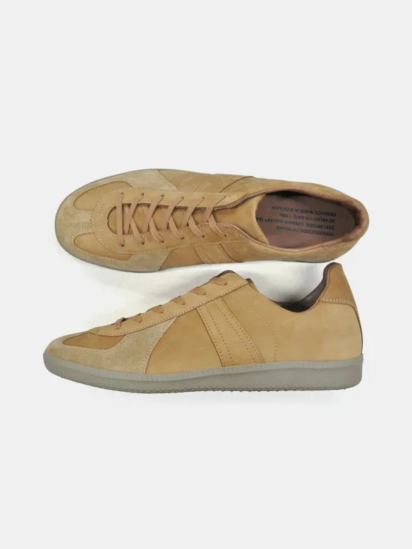 Reproduction of Found German Military Trainers sold by Alex Mill