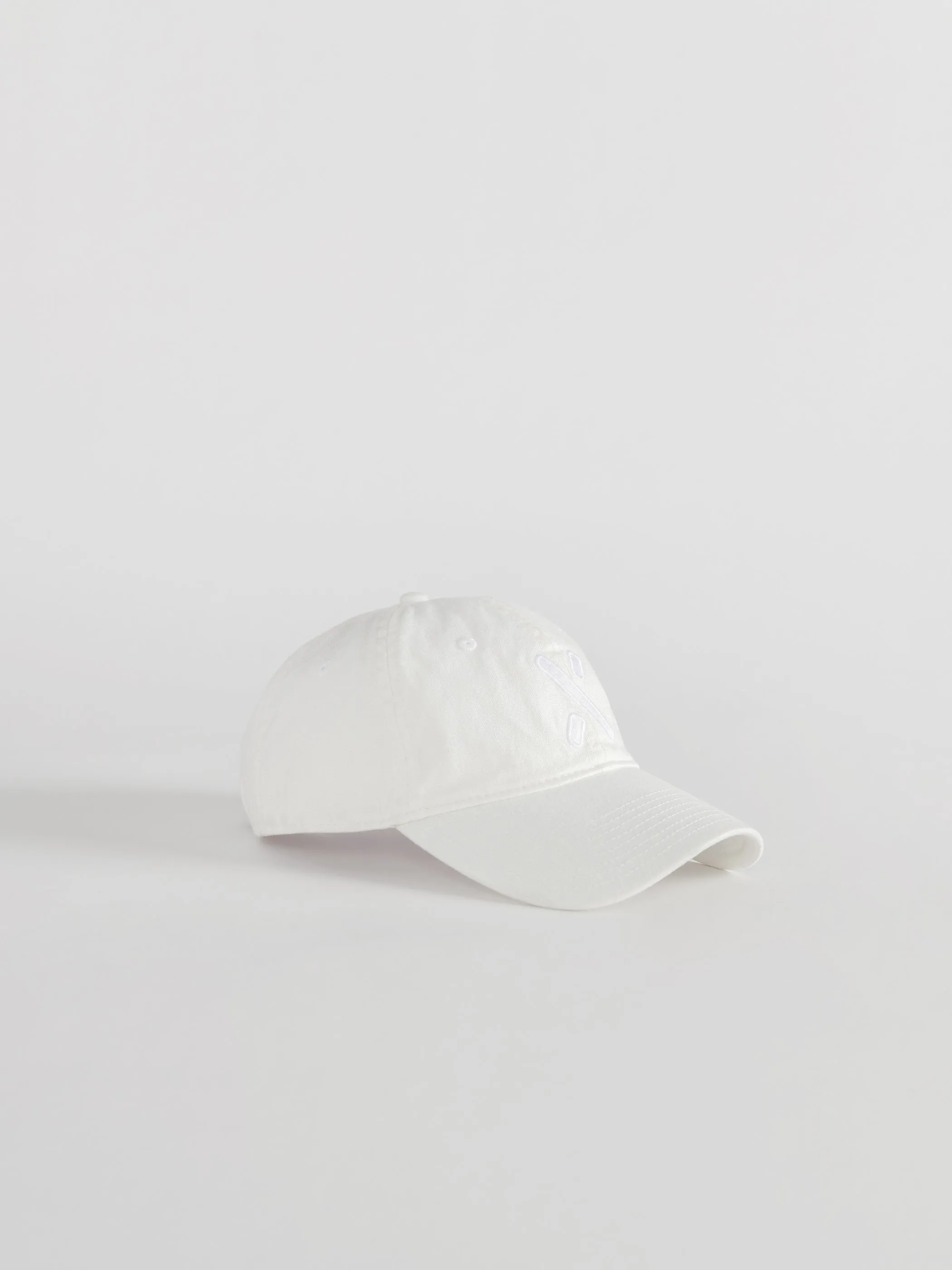 X Canvas Field Cap sold by Alex Mill