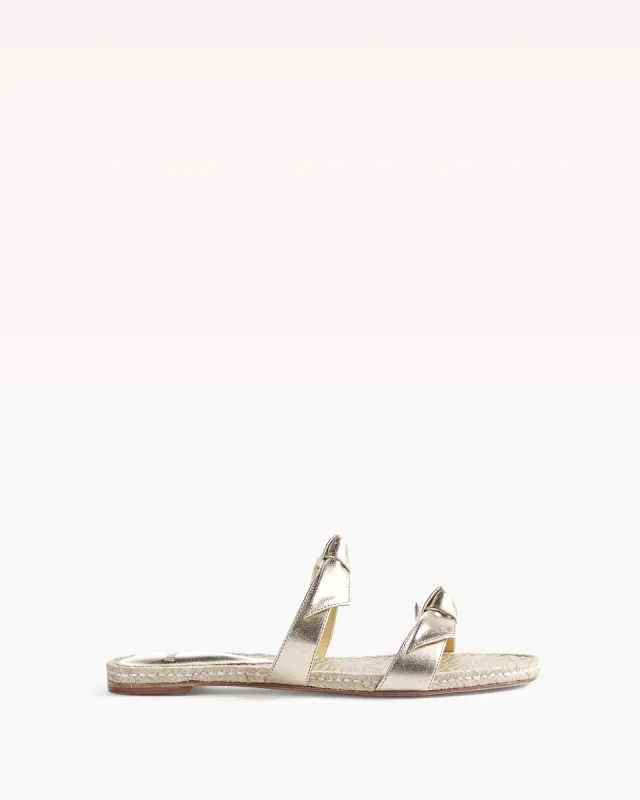 Clarita Flat Metallic Golden sold by Alexandre Birman