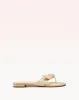 Asymmetric Clarita Flat Eggshell sold by Alexandre Birman
