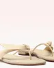 Asymmetric Clarita Flat Eggshell sold by Alexandre Birman
