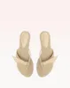 Asymmetric Clarita Flat Eggshell sold by Alexandre Birman