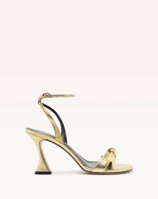 Clarita Bell 85 Metallic Golden sold by Alexandre Birman