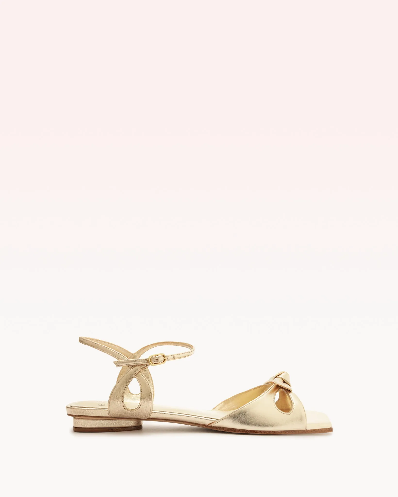 Clarita Eyelet Flat Metallic Golden sold by Alexandre Birman