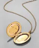 Antique 1920s 14k Gold Filled Hand Etched Floral Oval Locket Necklace sold by Alexis Bittar