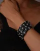 Punk Deco Lucite Crystal Hinge Bracelet- Black sold by Alexis Bittar