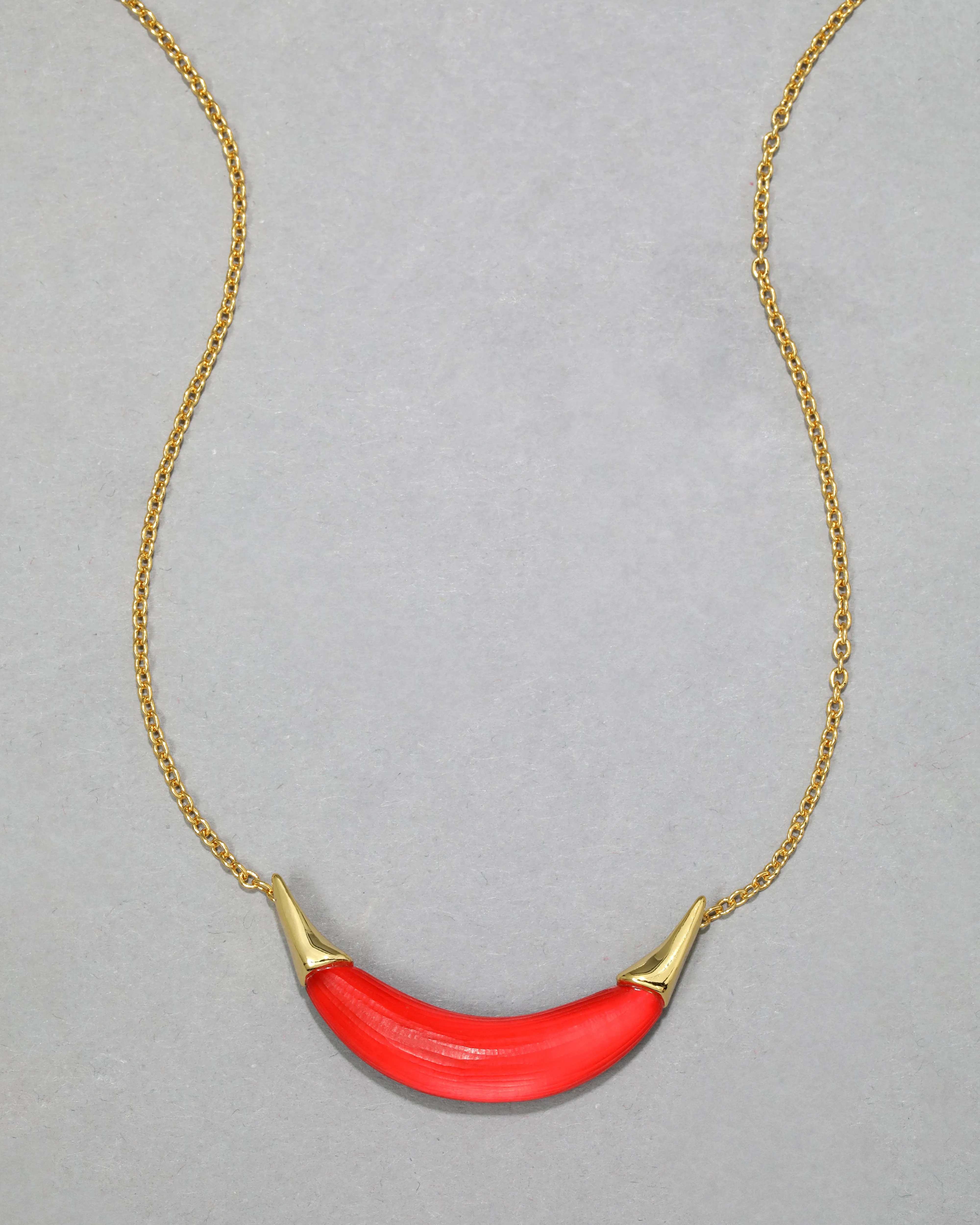 Gold Capped Crescent Lucite Necklace- Lipstick Red sold by Alexis Bittar