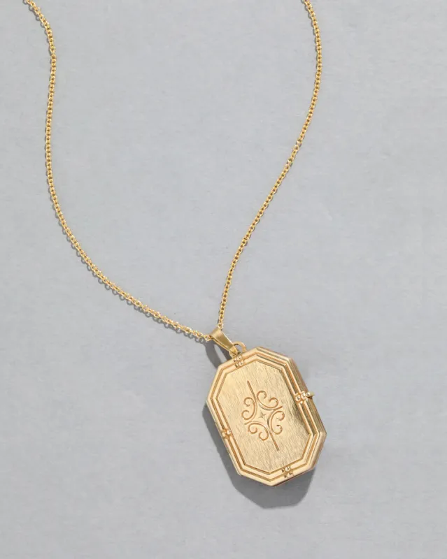 Antique 1920s 14k Gold Fancy Hand Etched Locket Necklace sold by Alexis Bittar