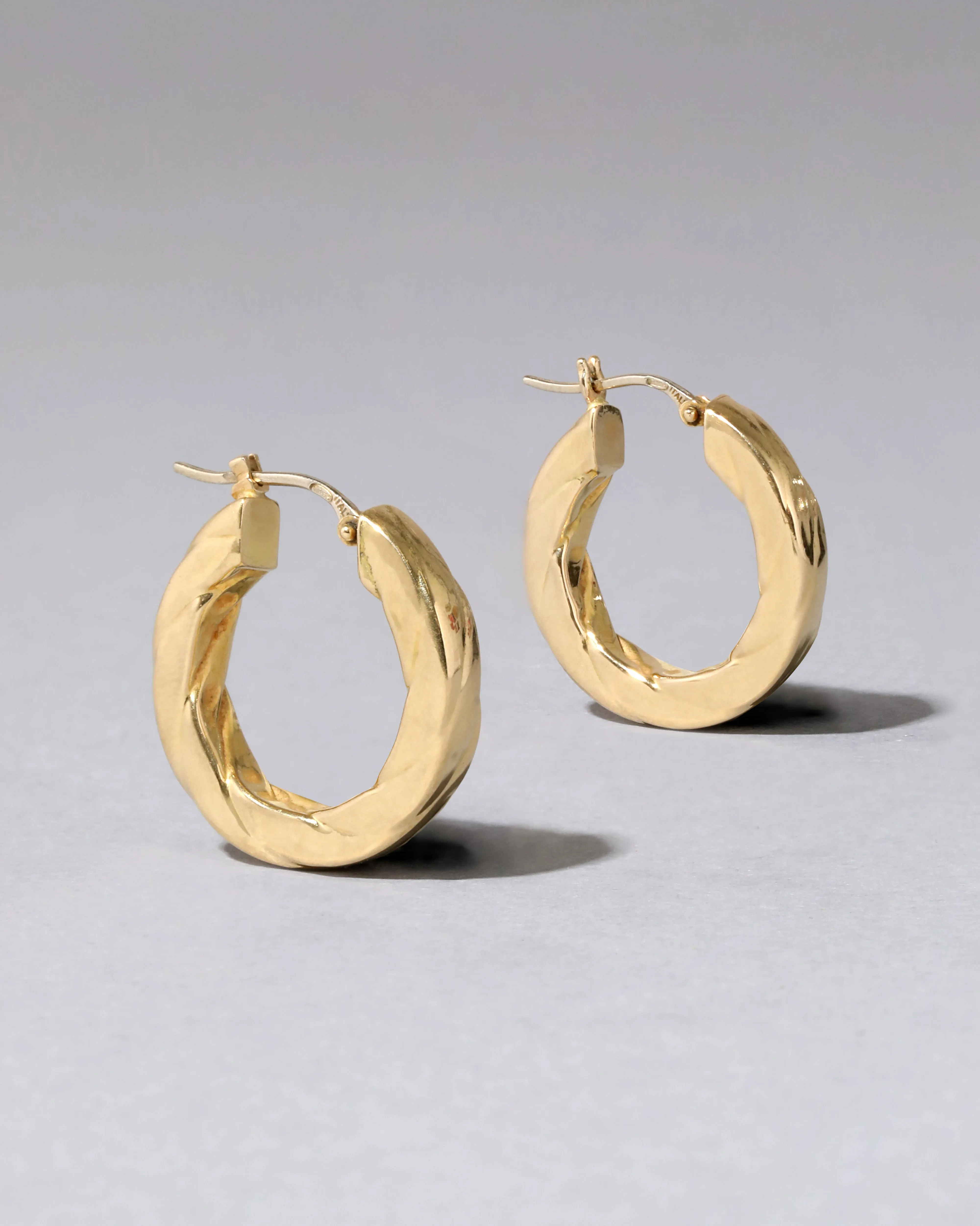 Vintage 1980s 18k Gold Twisted Hoop Earring sold by Alexis Bittar