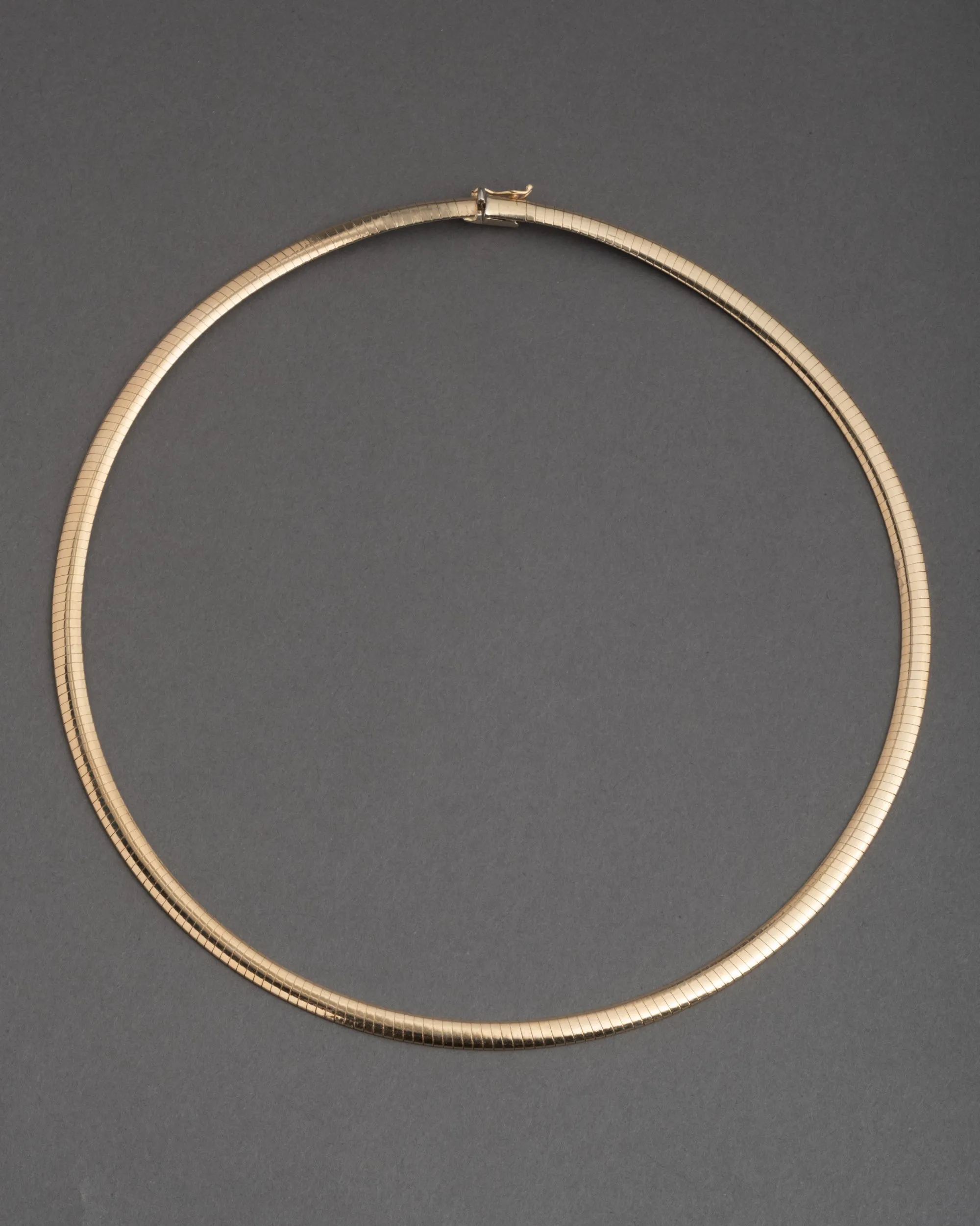 Vintage 1980s 14k Gold Small Omega Necklace sold by Alexis Bittar