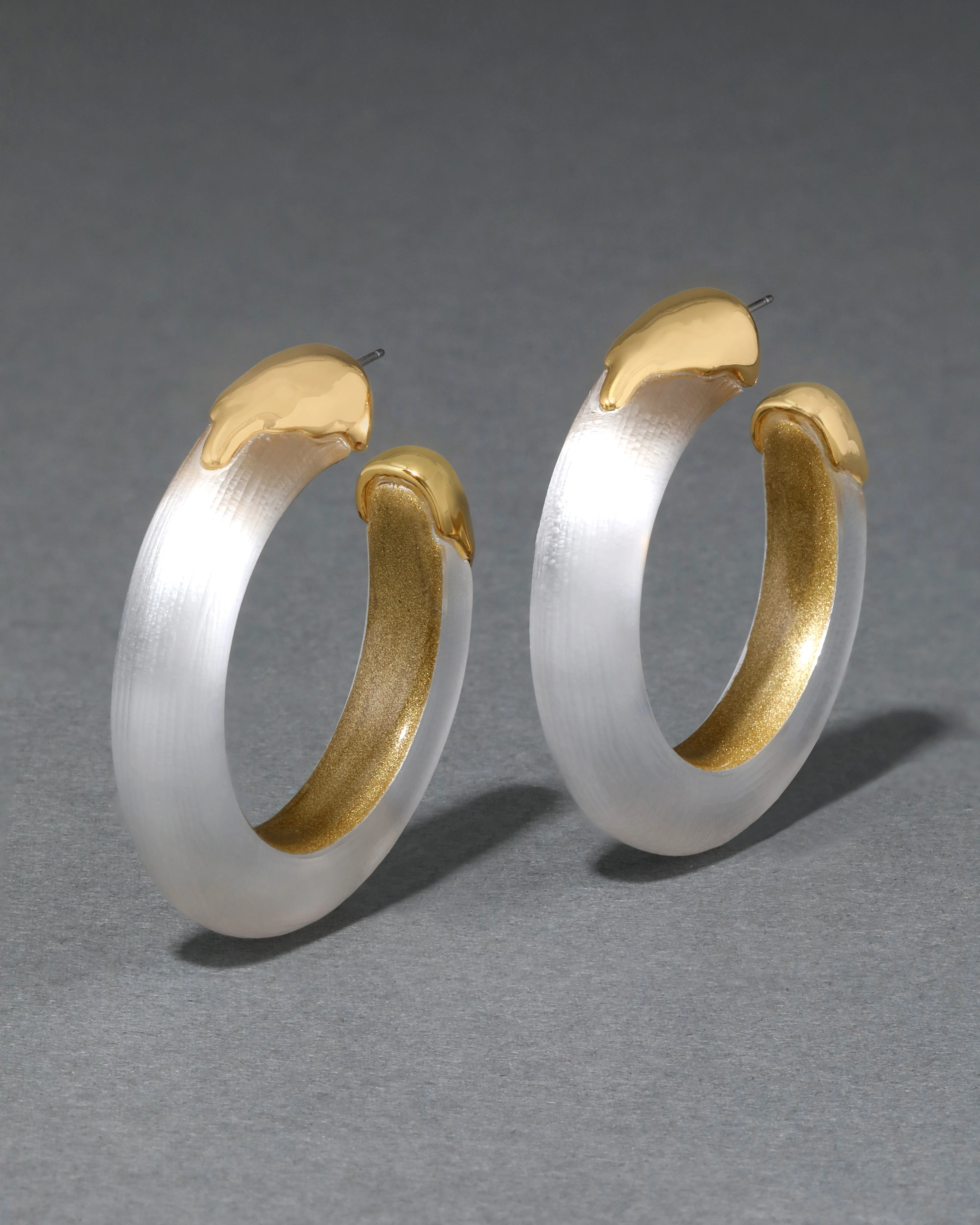 Luminous Lucite Gold Dipped Hoop Earring- Silver sold by Alexis Bittar