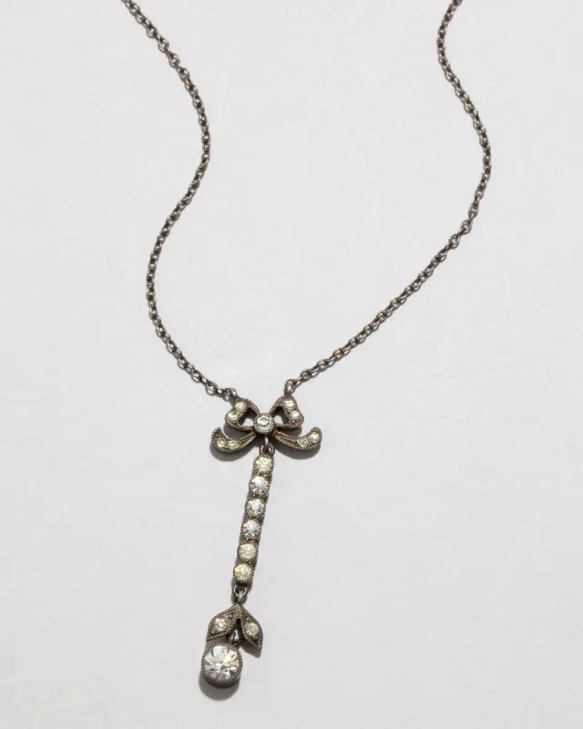 Antique Sterling Silver and Paste Stone Bow Necklace with Drop sold by Alexis Bittar