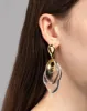 Liquid Lucite Ripple Drop Earring sold by Alexis Bittar