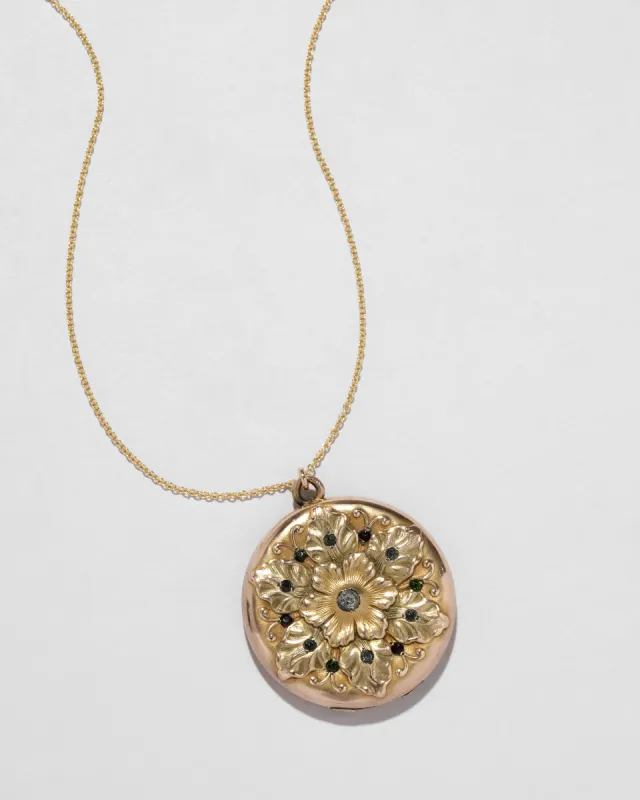 Antique 1800s 14k Gold Filled Crystal Embellished Floral Locket Necklace sold by Alexis Bittar