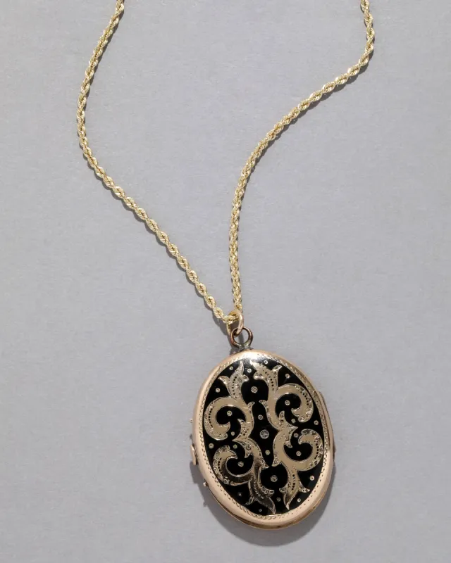 Vintage 14k Gold & Black Enamel Locket Necklace sold by Alexis Bittar
