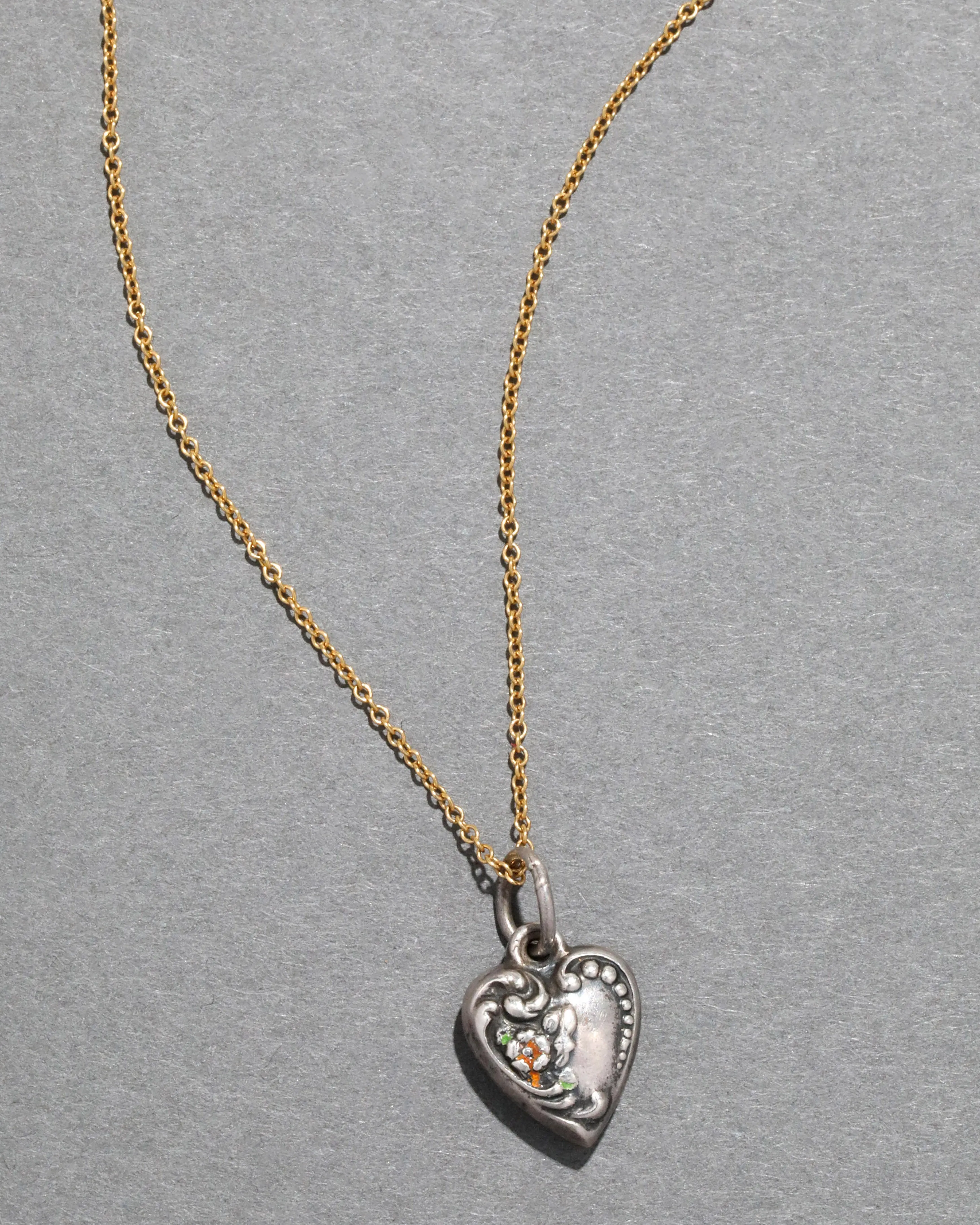 Sterling Silver Single Flower Heart Pendant Necklace sold by Alexis Bittar