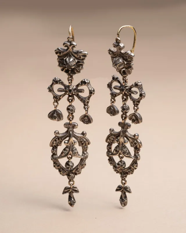 Antique Sterling Silver and Rose Cut Diamond Bow Drop Earrings with 9k Rose Gold Back sold by Alexis Bittar