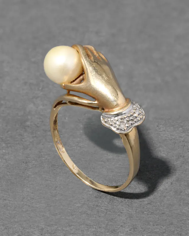Vintage 1940s 14k Gold Hand Ring Motif Ring with Cultured Pearl & Diamond sold by Alexis Bittar