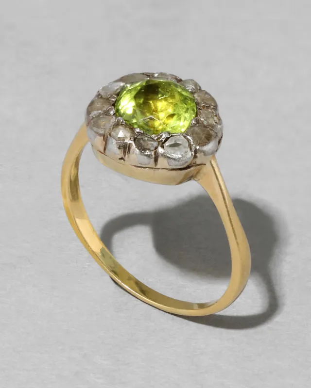 Antique Mid 1800s 14k Gold & Sterling Silver Two Tone Peridot & Diamond Halo Ring sold by Alexis Bittar