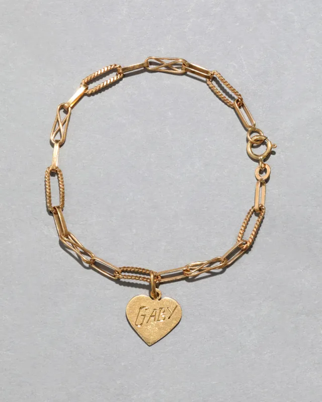 Vintage 18k Gold Link Bracelet with Heart Charm sold by Alexis Bittar
