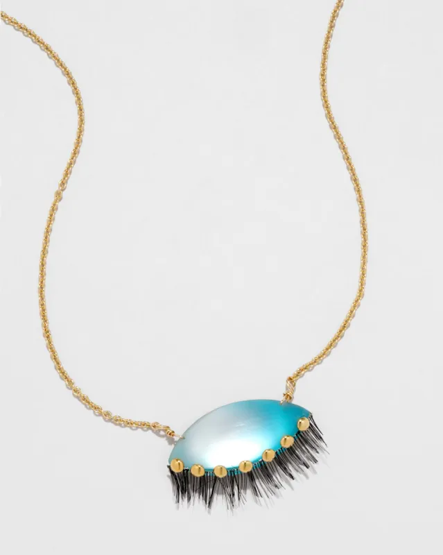 Archive Lucite Sleeping Eye Pendant Necklace sold by Alexis Bittar