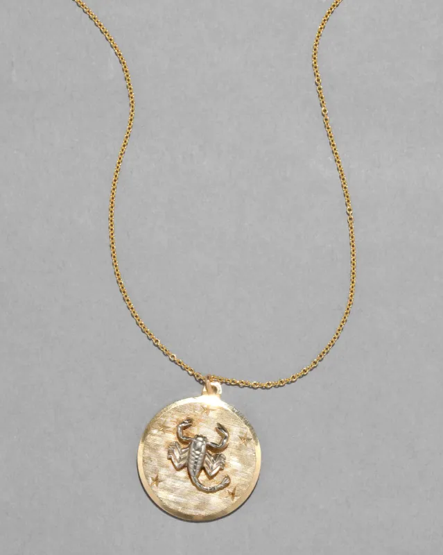 Vintage 1980s 14k Two Tone Yellow & White Gold Scorpio Pendant Necklace sold by Alexis Bittar
