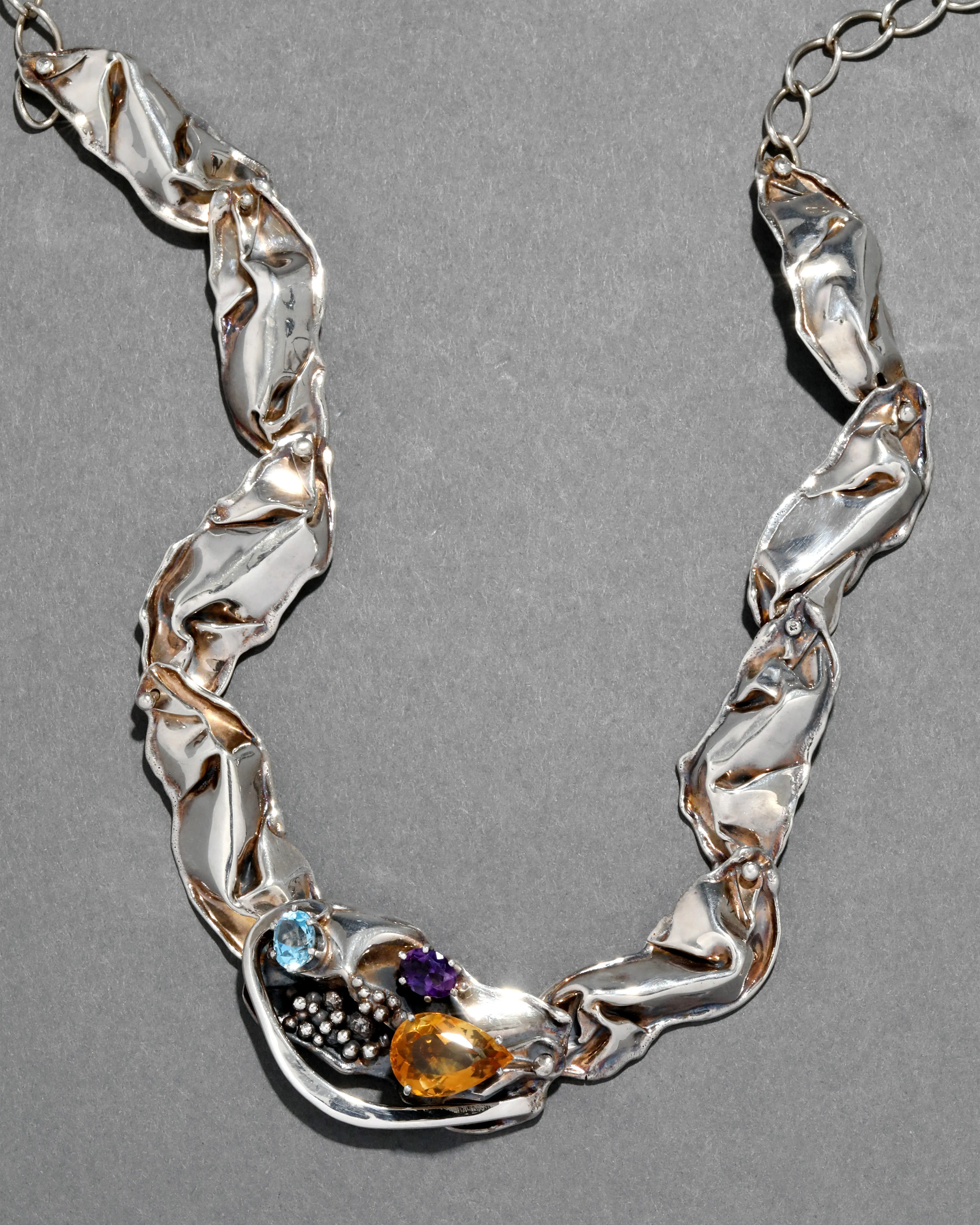 Vintage 1980s Sterling Silver Handmade Abstract Modernist Necklace with Citrine, Blue Topaz & Amethyst sold by Alexis Bittar