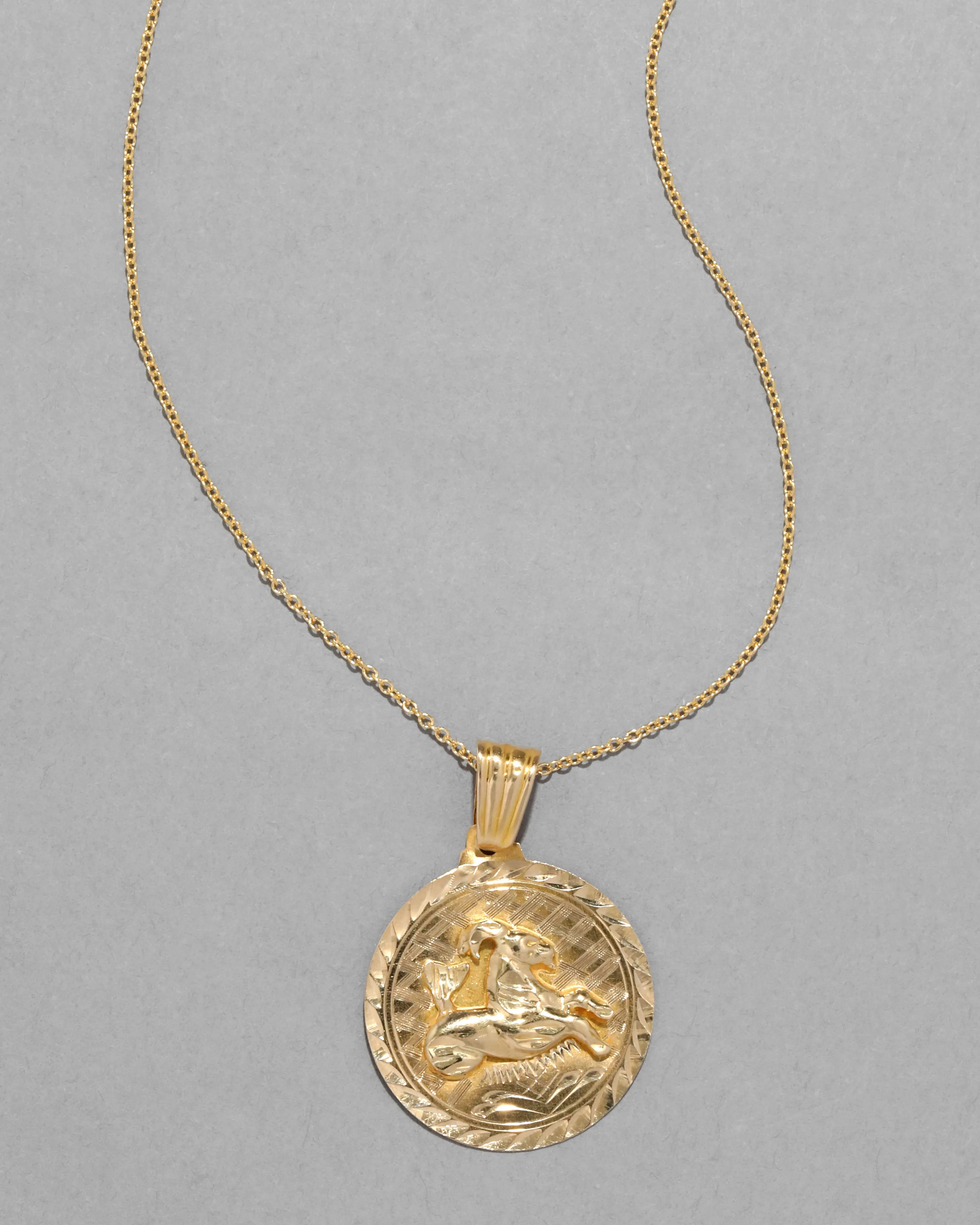Vintage 1980s 14k Gold Capricorn Pendant Necklace sold by Alexis Bittar