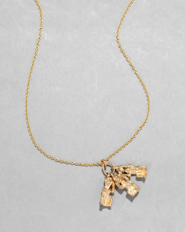 Vintage 1970s 14k Gold Speak No Evil Pendant Necklace sold by Alexis Bittar