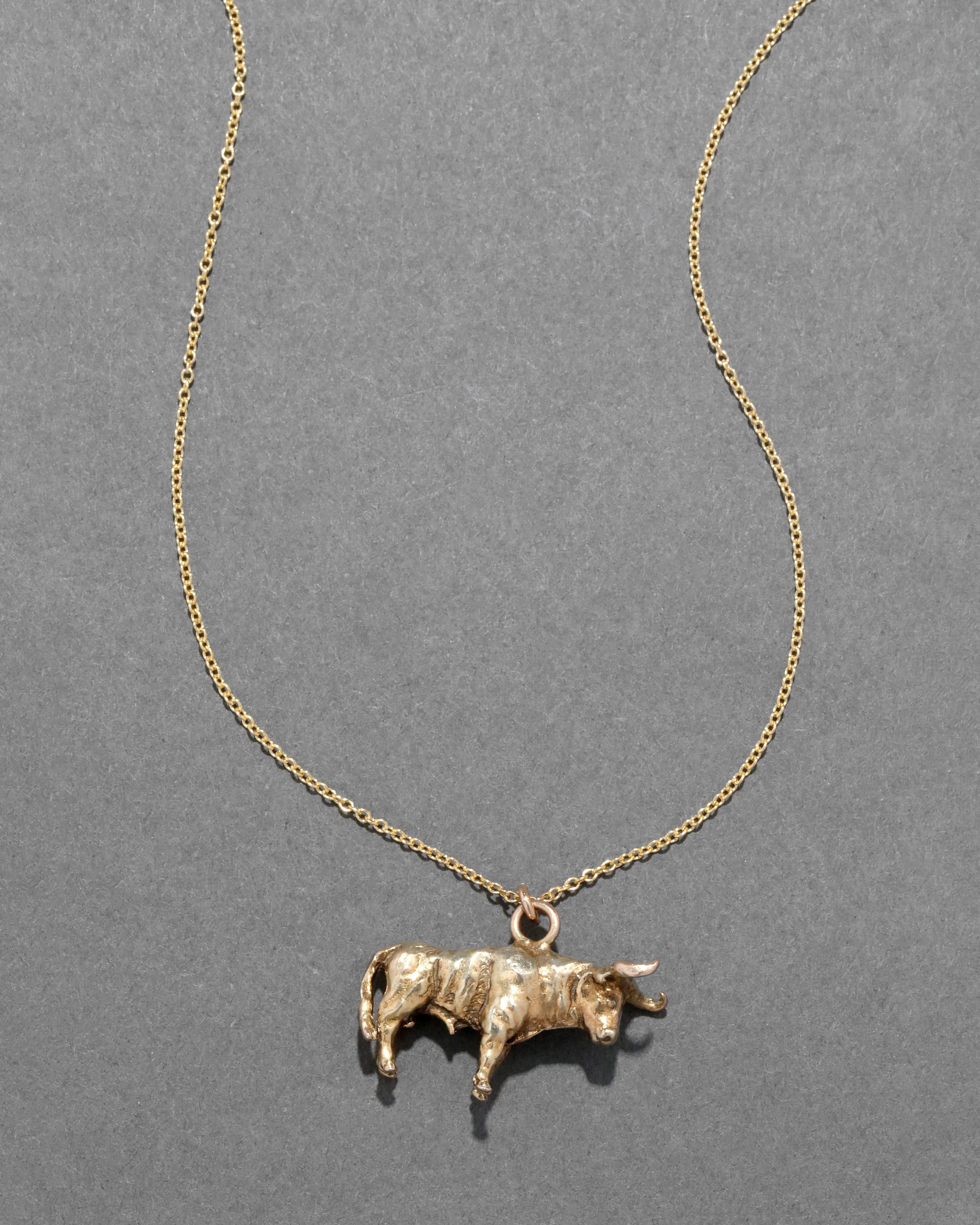 Antique 1900s 10k Gold Handmade Bull Pendant Necklace sold by Alexis Bittar