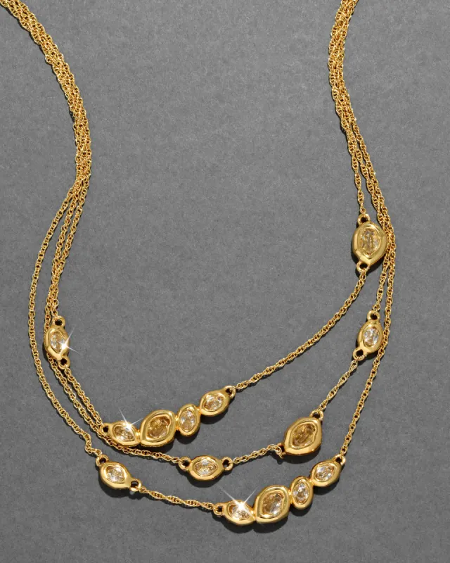 Layered Molten Gold Crystal Station Necklace sold by Alexis Bittar