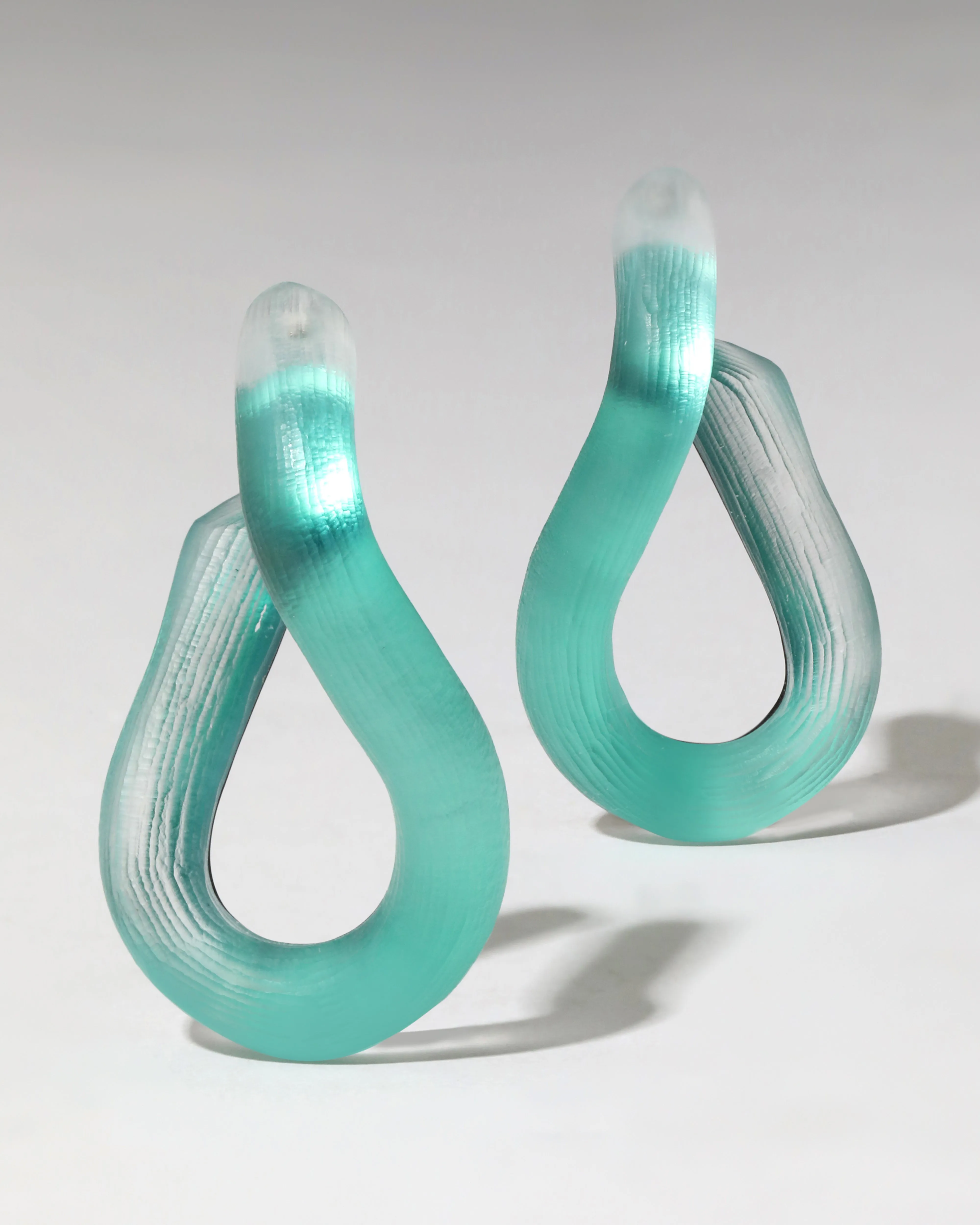 Lucite Twist Hoop Earring- Dark Teal sold by Alexis Bittar