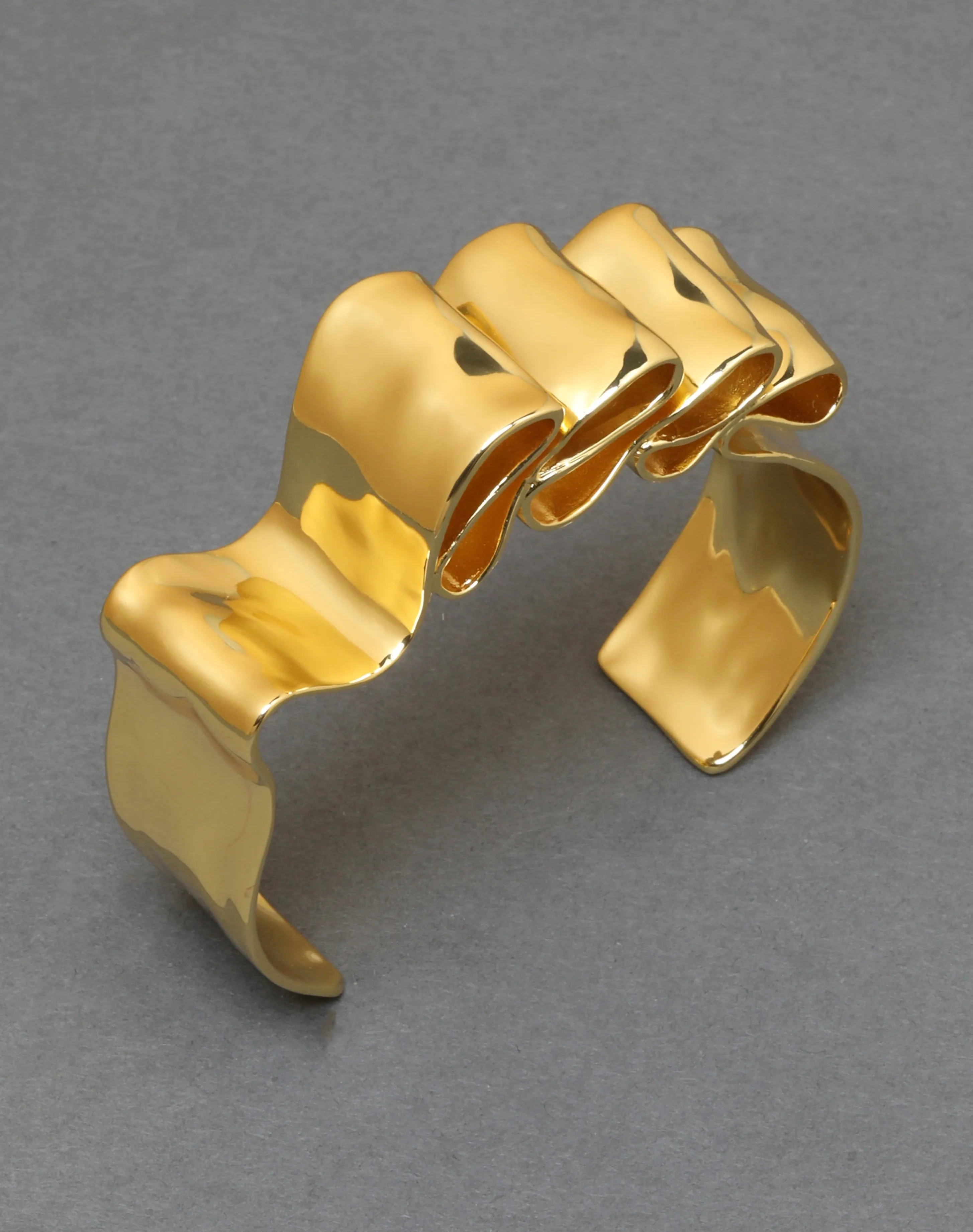 Twisted Gold Folded Ribbon Cuff Bracelet sold by Alexis Bittar