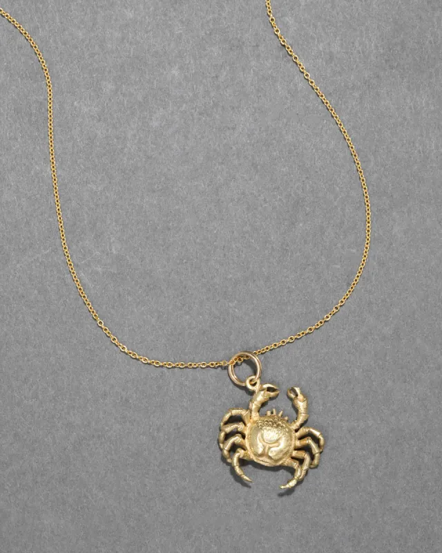 Vintage 1980s 14k Gold Cancer Zodiac Pendant Necklace sold by Alexis Bittar