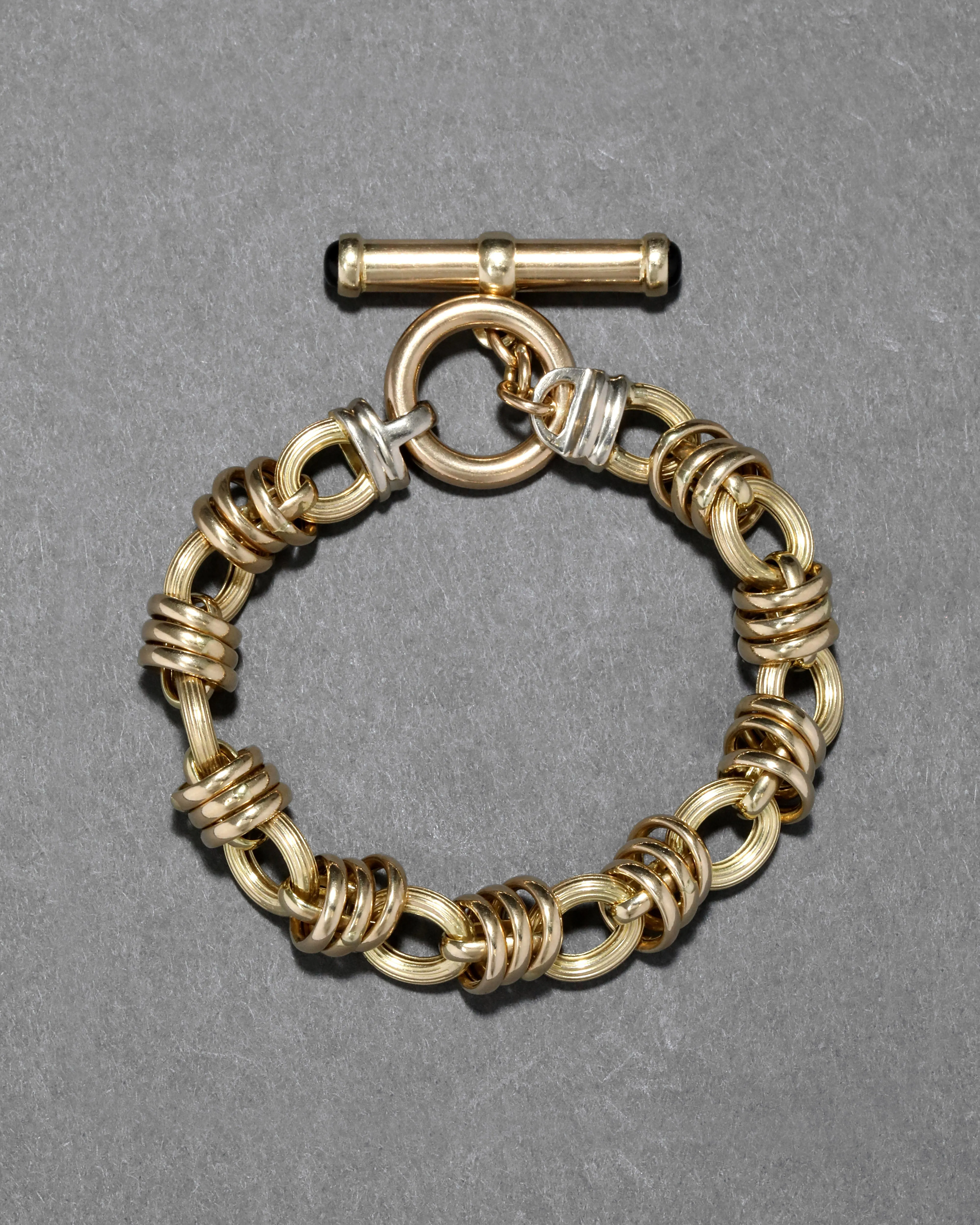 Vintage 14k Two Tone Yellow & White Gold Ribbed & Smooth Link Bracelet sold by Alexis Bittar