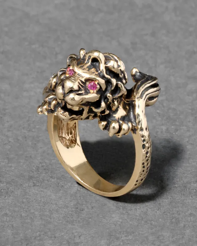 Vintage 1980s 14k Gold Textured Gold Lion Ring with Ruby Eyes sold by Alexis Bittar