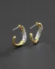 Solanales Gold Crystal Twist Mini Hoop Earring sold by Alexis Bittar