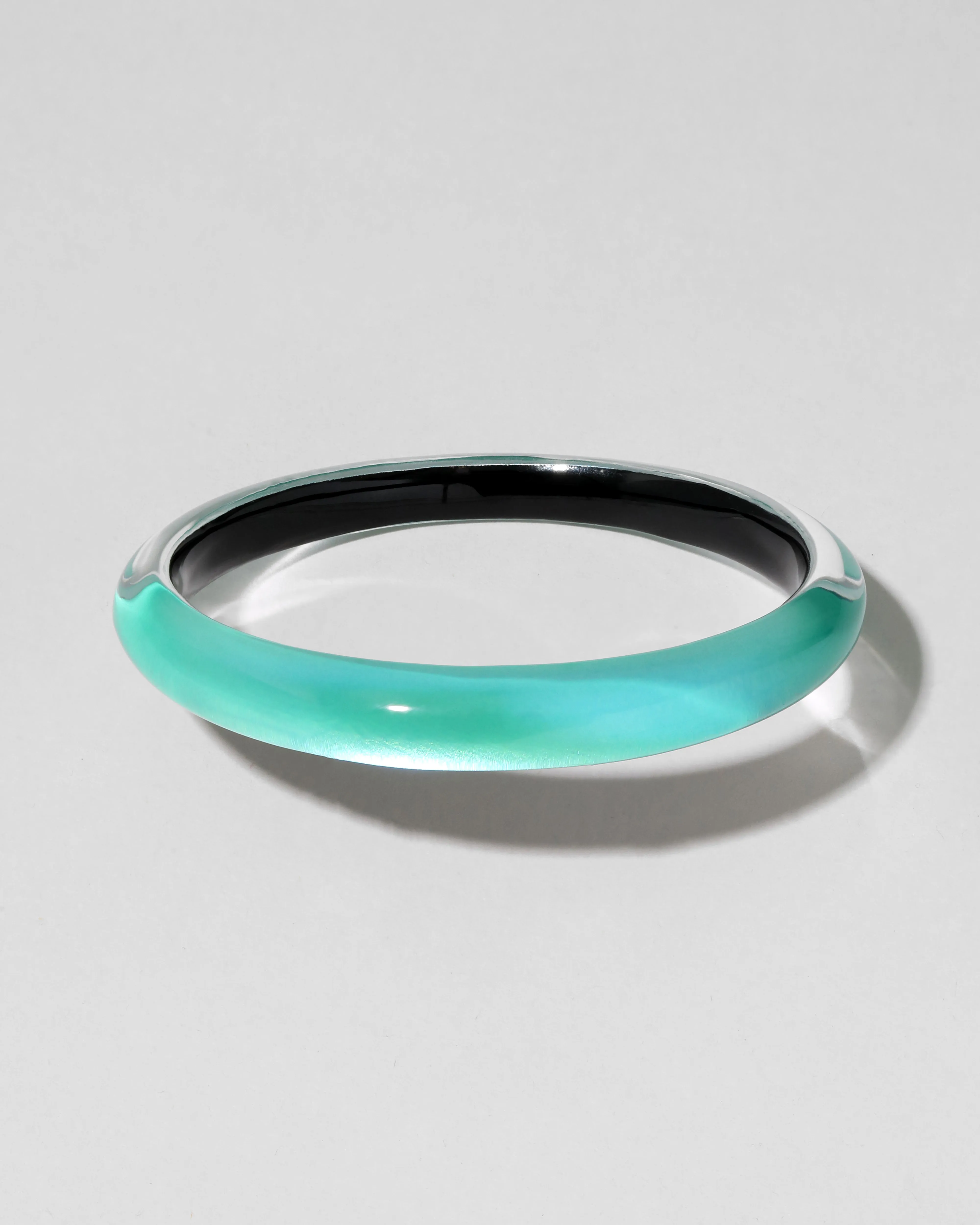 Lucite Skinny Bangle Bracelet- Mediterranean Opal sold by Alexis Bittar