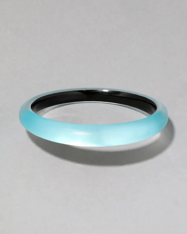 Luminous Lucite Skinny Bangle Bracelet- Icy Blue sold by Alexis Bittar