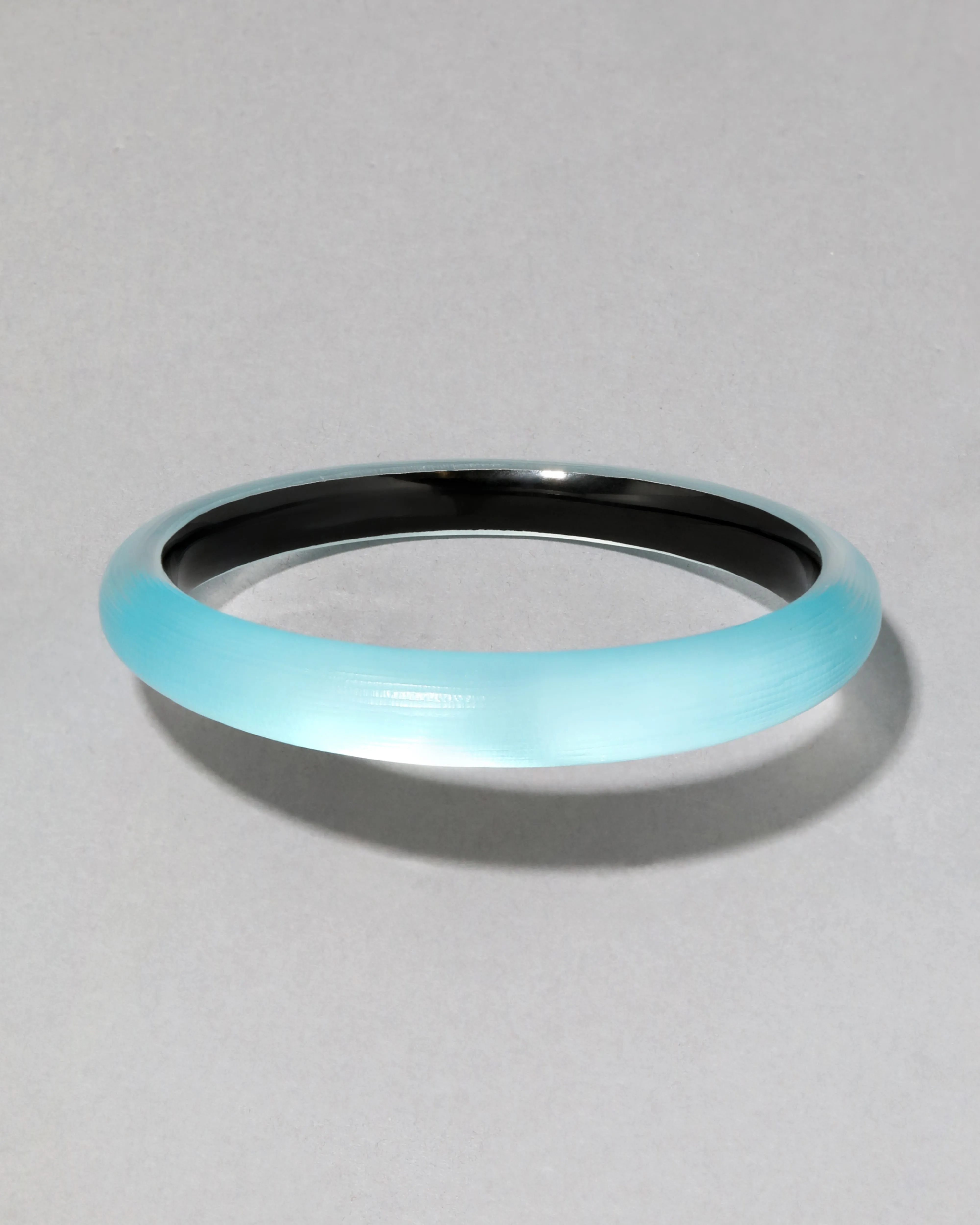 Luminous Lucite Skinny Bangle Bracelet- Icy Blue sold by Alexis Bittar