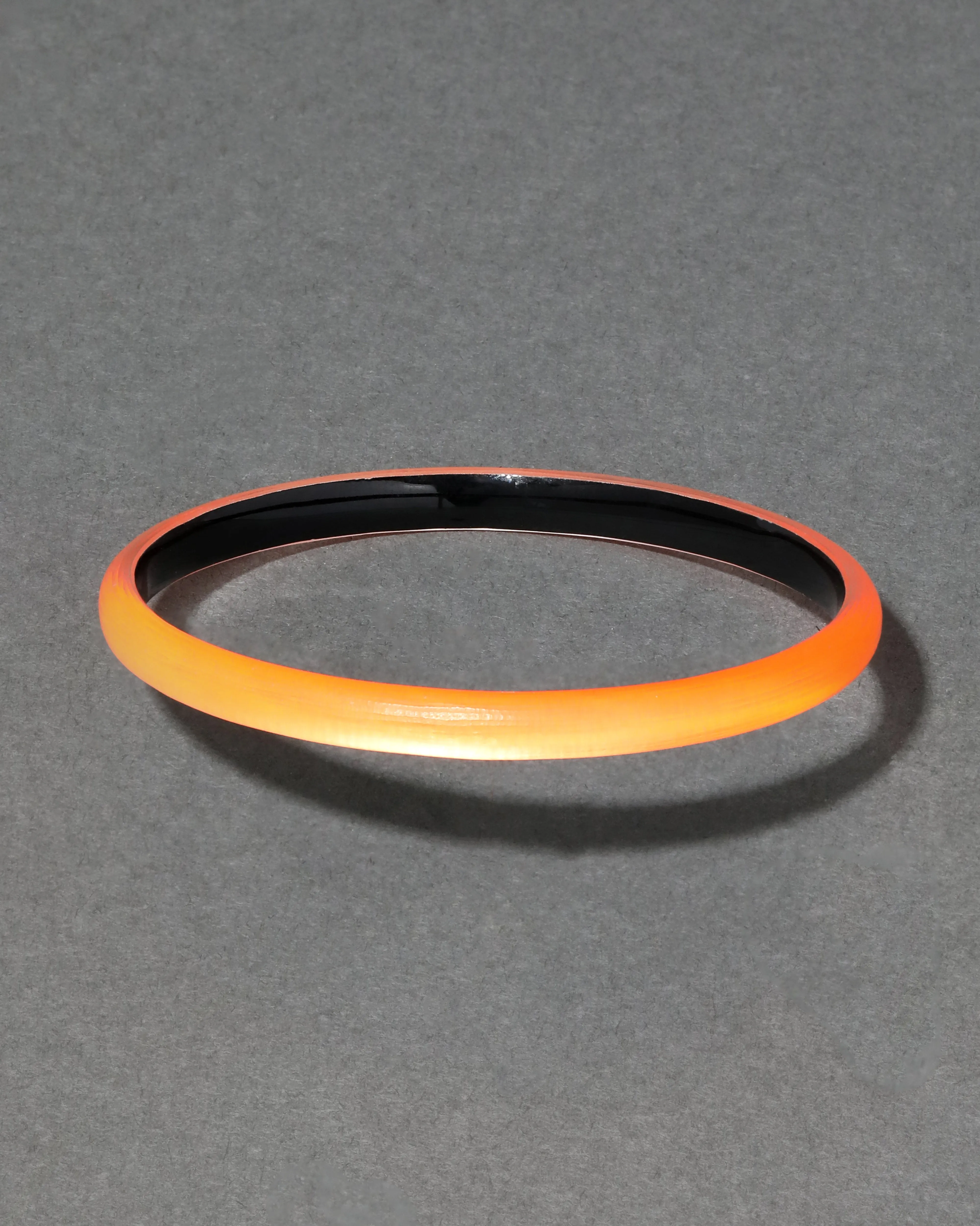 Luminous Lucite Super Skinny Bangle Bracelet- Neon Orange sold by Alexis Bittar