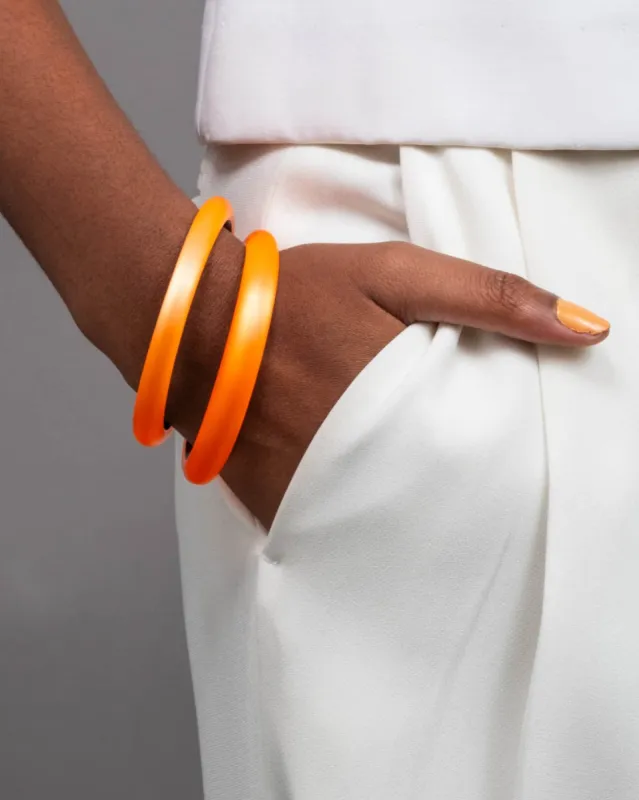 Lucite Skinny Bangle Bracelet- Neon Orange sold by Alexis Bittar
