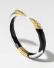 Mirrored Pyramid Lucite Brake Hinge Bracelet- Onyx sold by Alexis Bittar
