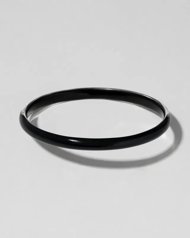 Luminous Lucite Super Skinny Bangle Bracelet- Onyx sold by Alexis Bittar