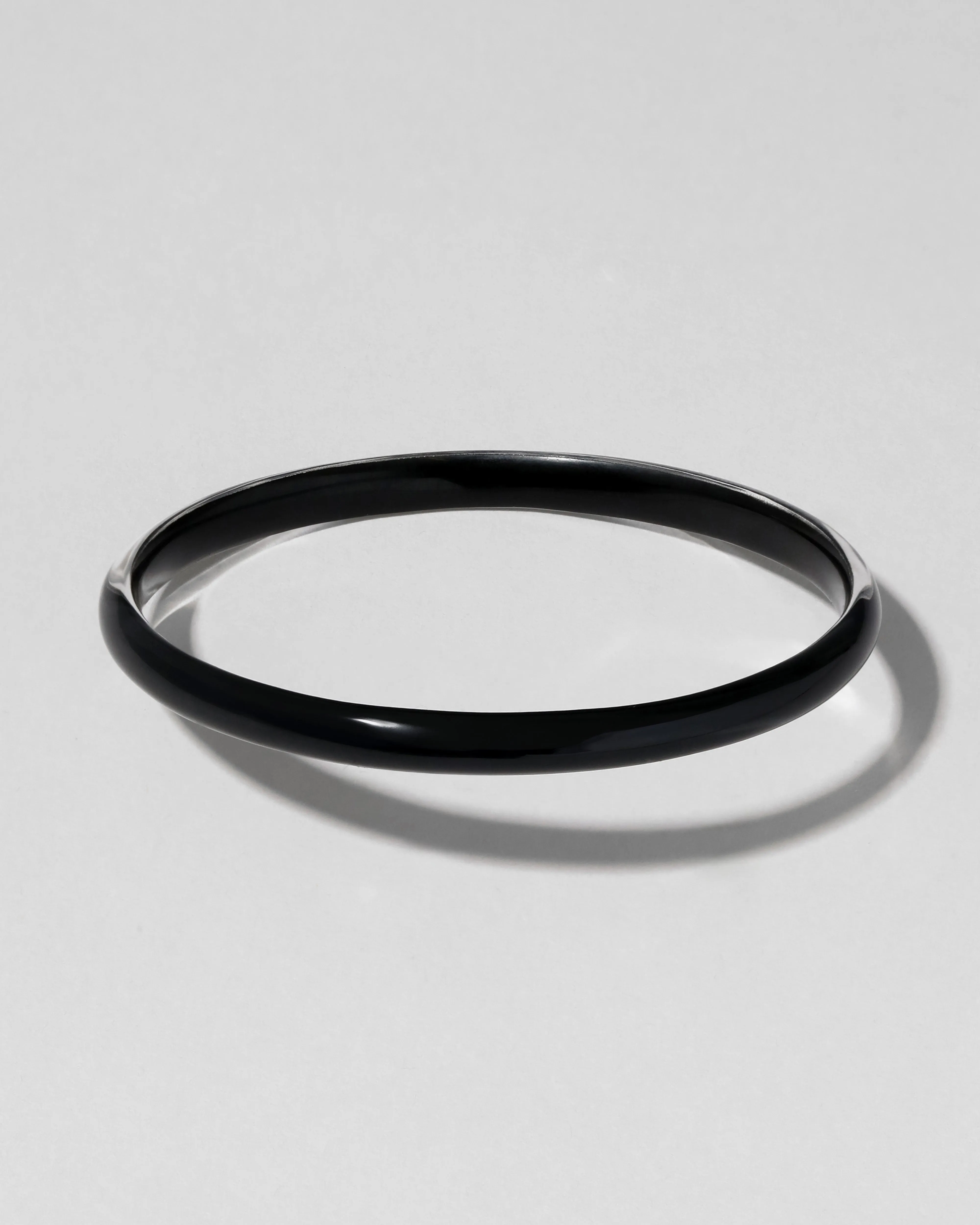 Luminous Lucite Super Skinny Bangle Bracelet- Onyx sold by Alexis Bittar