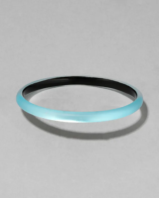 Luminous Lucite Super Skinny Bangle Bracelet- Icy Blue sold by Alexis Bittar