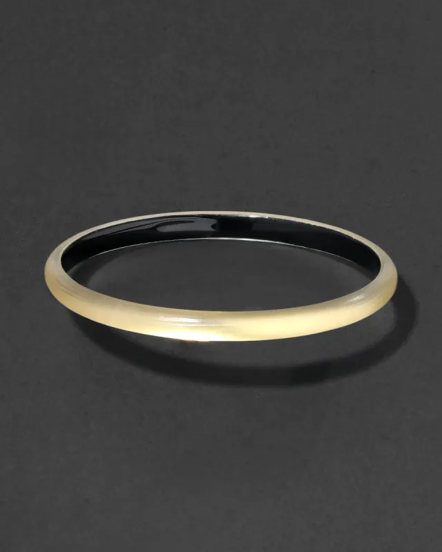 Luminous Lucite Super Skinny Bangle Bracelet- Gold sold by Alexis Bittar
