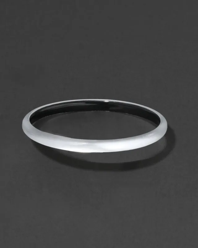 Luminous Lucite Super Skinny Bangle Bracelet- Silver sold by Alexis Bittar