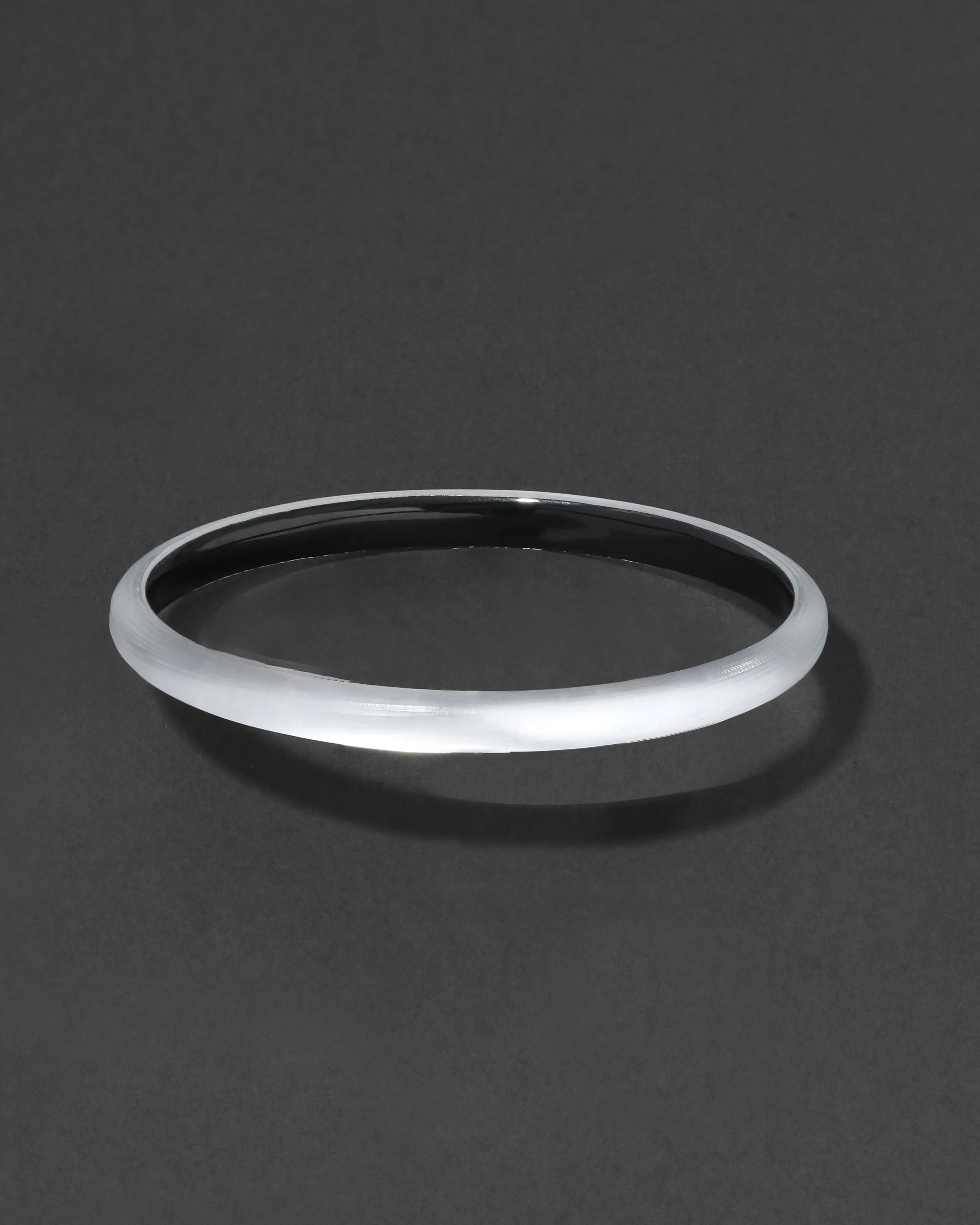 Luminous Lucite Super Skinny Bangle Bracelet- Silver sold by Alexis Bittar